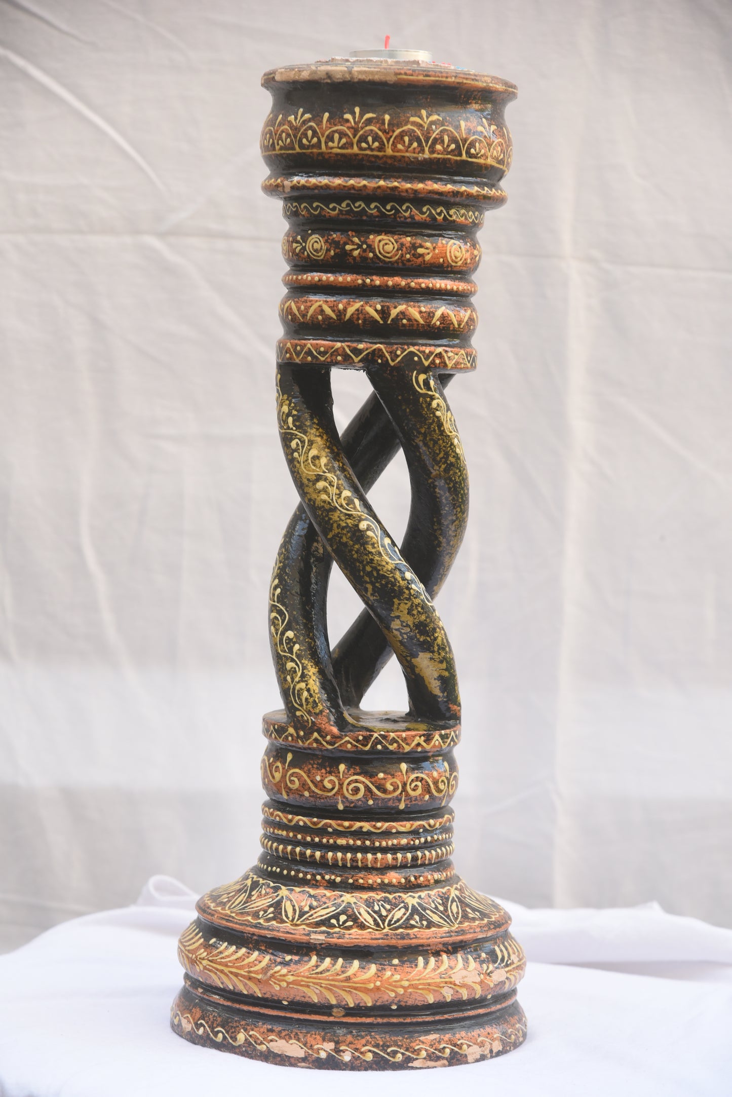 Wood carved candle holder