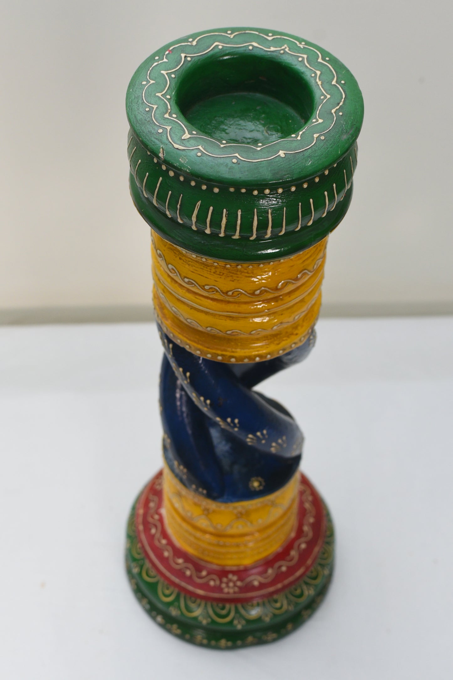 Wood carved candle holder