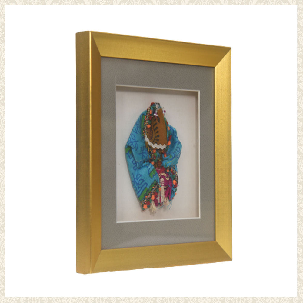 Vintage Fabric Doll in frame