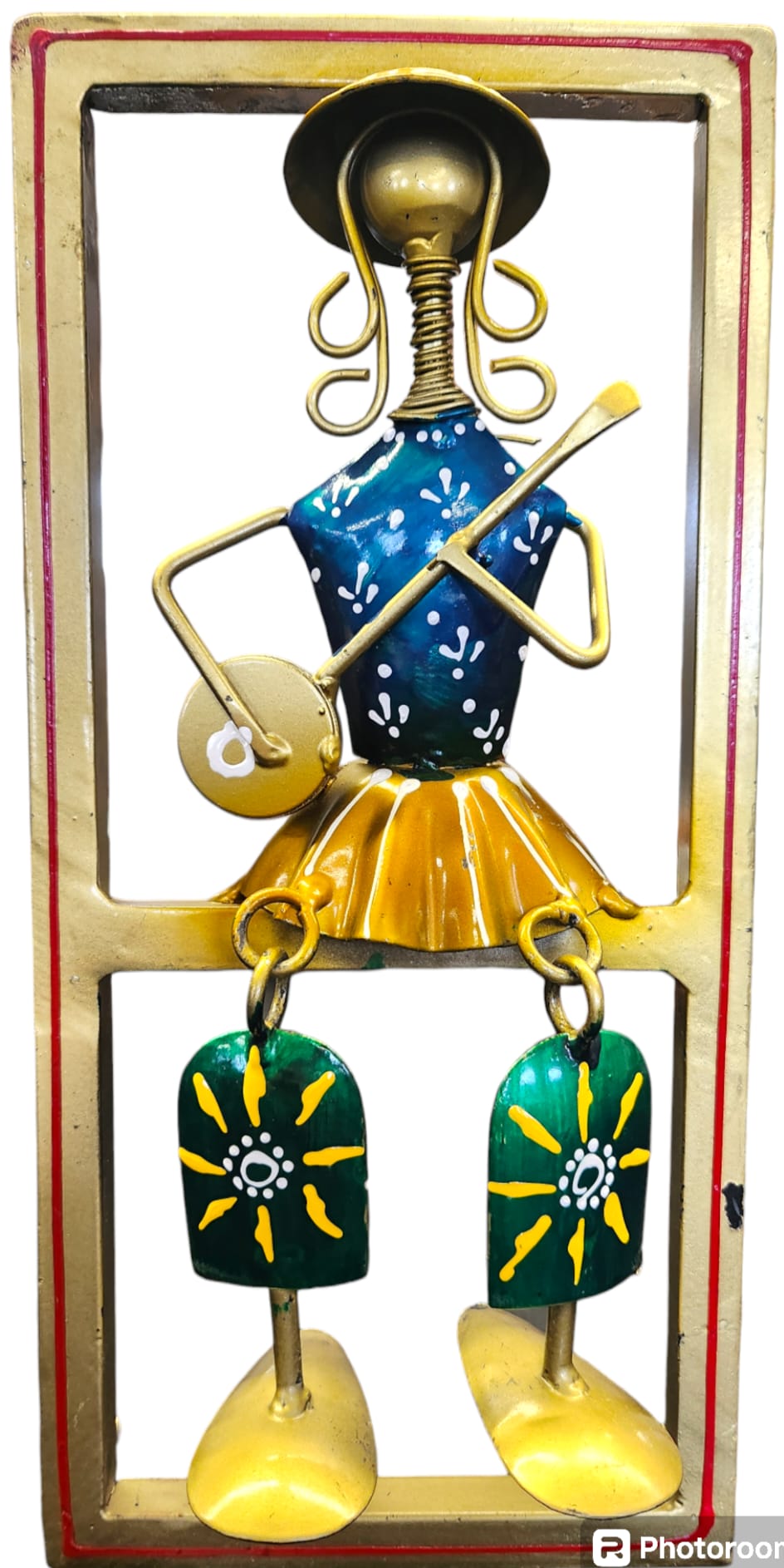 Indian folk musician in metal frame