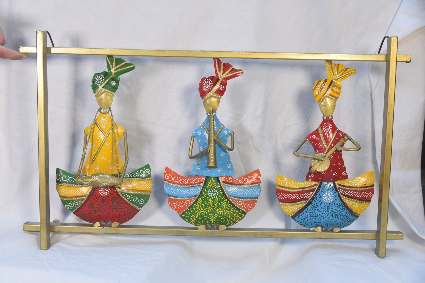 Handmade set of 3 dancing musicians encased in gold metal frame