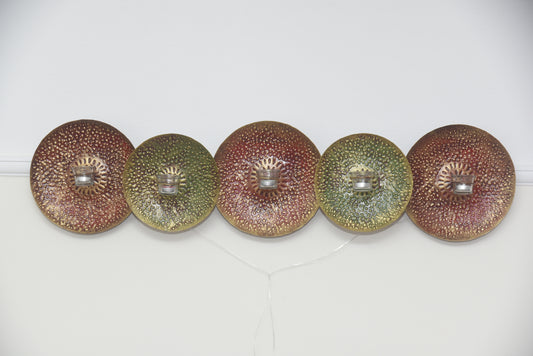 Metal round red and green wall art with tealight