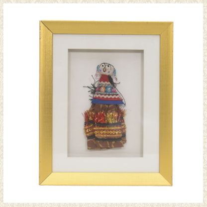 Handmade cloth puppet in frame