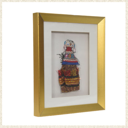 Handmade cloth puppet in frame