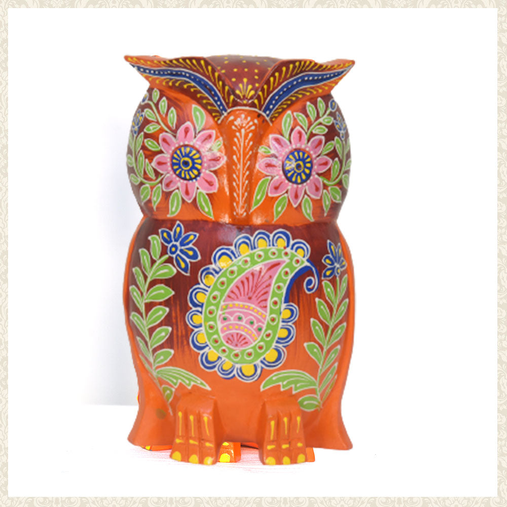 Handmade wooden owl painted with vegetable colour
